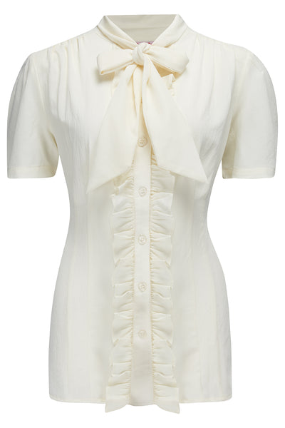 **Sample Sale** The "Betsy" Ruffle, Pussybow Blouse in Antique White, True & Authentic 1950s Vintage Style - True and authentic vintage style clothing, inspired by the Classic styles of CC41 , WW2 and the fun 1950s RocknRoll era, for everyday wear plus events like Goodwood Revival, Twinwood Festival and Viva Las Vegas Rockabilly Weekend Rock n Romance Rock n Romance