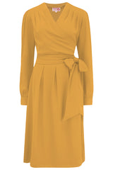 Das „Evie“ Langarm-Wickelkleid in Senf, echter und authentischer Vintage-Stil der späten 1940er und frühen 1950er Jahre