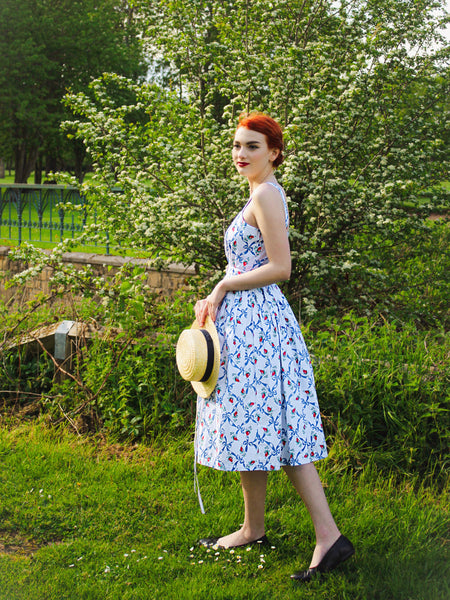 Limited Edition Judy Sun Dress & Matching Bolero in Rose Bow Print - True and authentic vintage style clothing, inspired by the Classic styles of CC41 , WW2 and the fun 1950s RocknRoll era, for everyday wear plus events like Goodwood Revival, Twinwood Festival and Viva Las Vegas Rockabilly Weekend Rock n Romance The Seamstress Of Bloomsbury