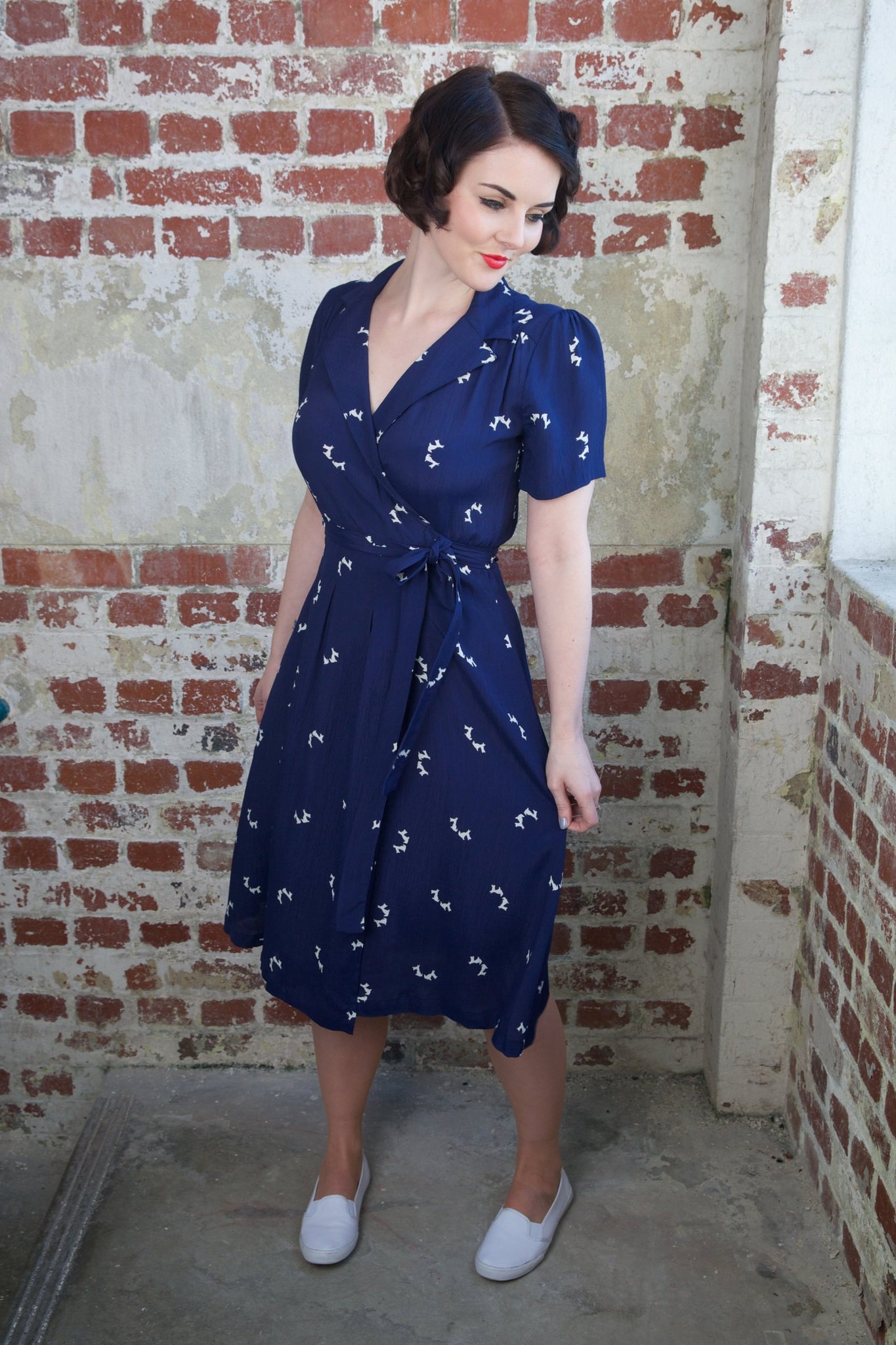 "Peggy" Wrap Dress in Navy Blue with Doggy Print Authentic 1940s Vintage Style - True and authentic vintage style clothing, inspired by the Classic styles of CC41 , WW2 and the fun 1950s RocknRoll era, for everyday wear plus events like Goodwood Revival, Twinwood Festival and Viva Las Vegas Rockabilly Weekend Rock n Romance The Seamstress of Bloomsbury